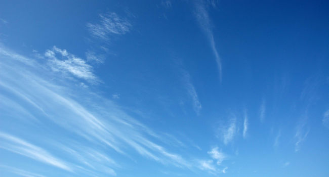 Photo of bright blue sky with some cirrus clouds