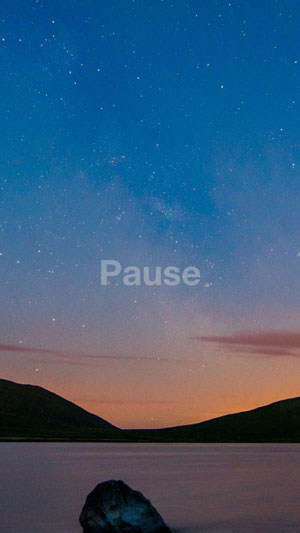 Photo of dusk with the word "Pause"